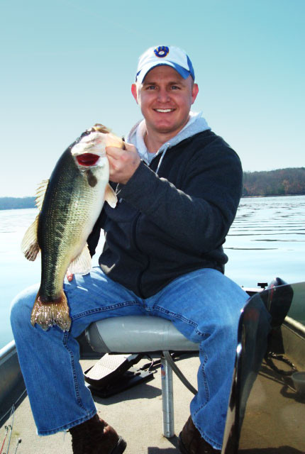 Ryan holding his fish catch of the day